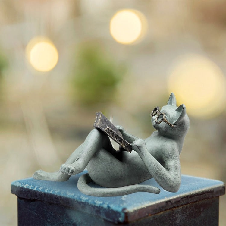 Statuette chat allongé